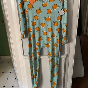 Onesie from Rue21 size medium teal with peaches on it